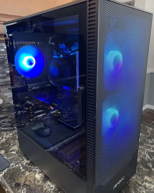Antec mesh-front PC build with blue-lit fans