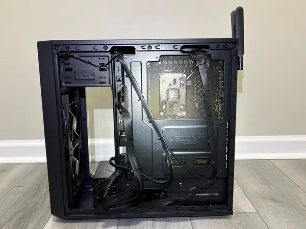 Cable management routed and tied behind a desktop motherboard tray